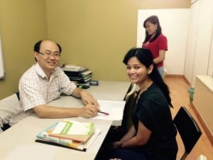 The founder Techer Ching (left) is teaching